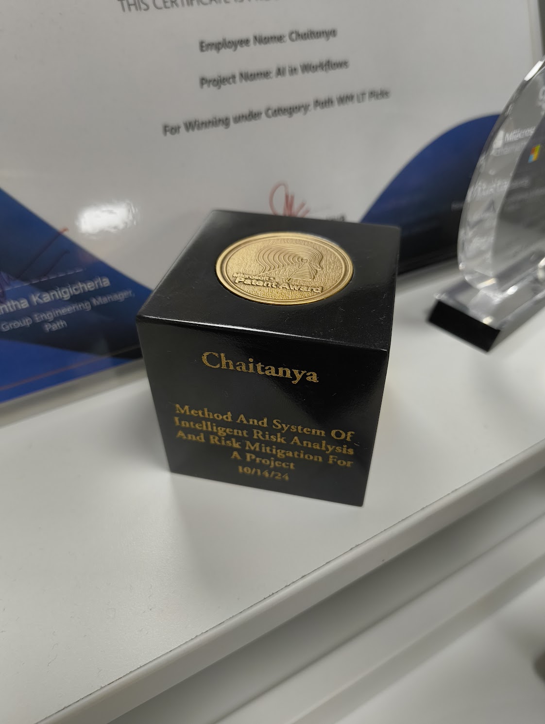 Microsoft Patent Award trophy for "Method and System of Intelligent Risk Analysis and Risk Mitigation for a Project", awarded to Chaitanya